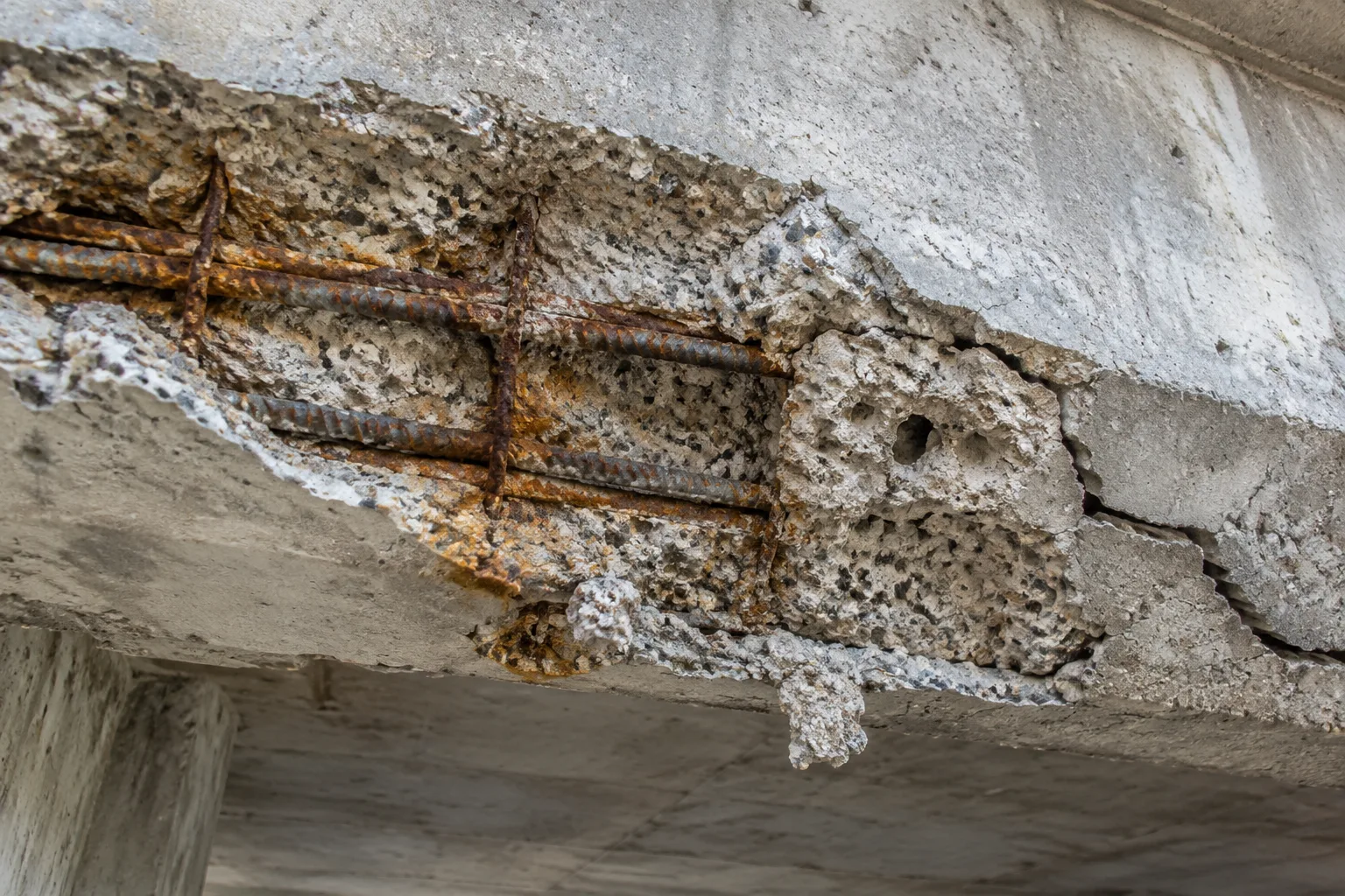 Concrete cracking, spalling and reinforcement corrosion